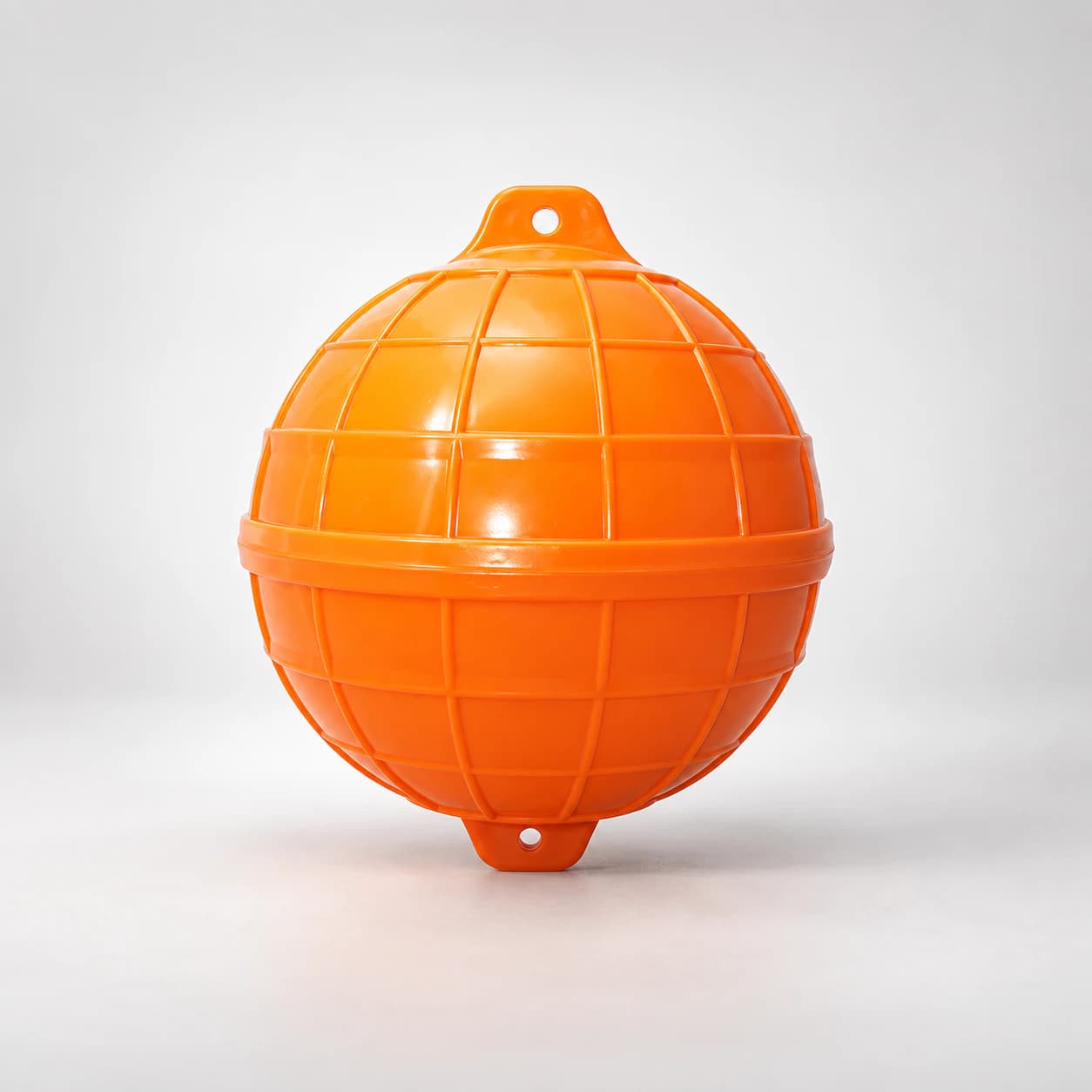An orange MM globe fishnet float with top and bottom eyelets