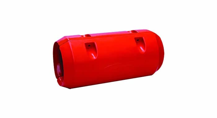 A red MM pipe float with slots along its length